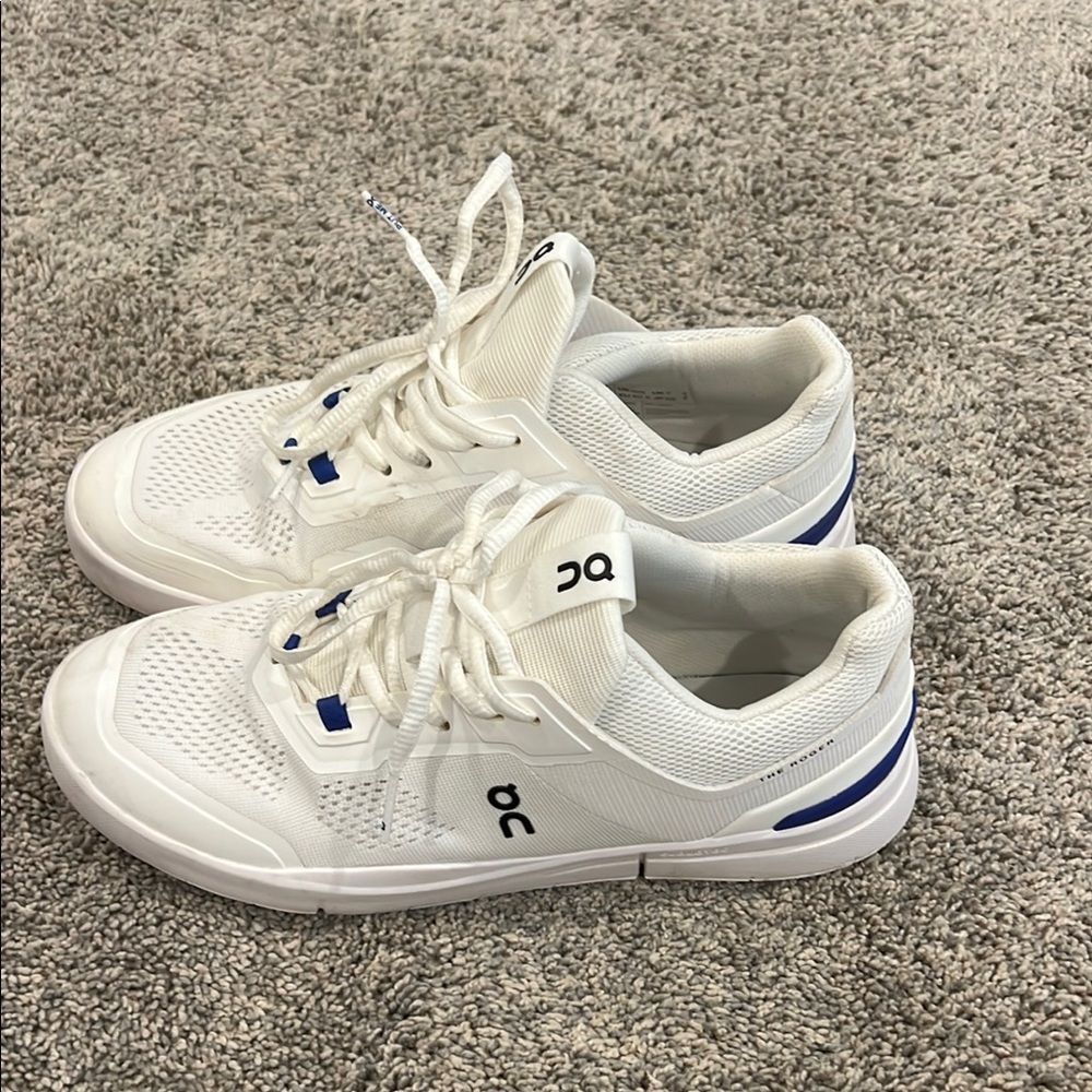 On Running White Sneakers with Blue Highlights